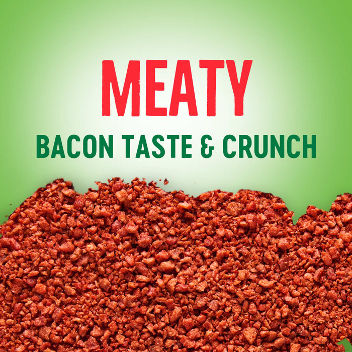 A close-up of crispy bacon bits with the words Meaty Bacon Taste &amp; Crunch above.