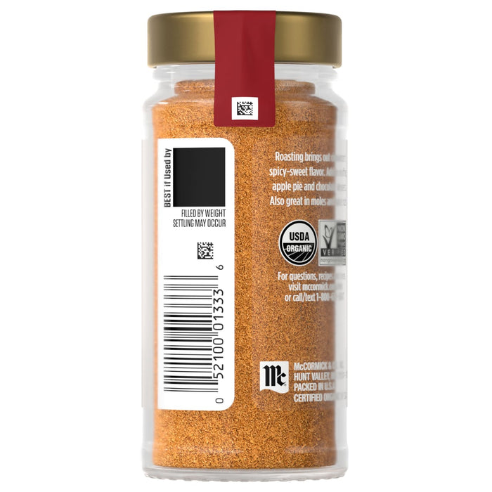 A jar of McCormick Organic Cajun Seasoning is displayed, showing the product's label and barcode.