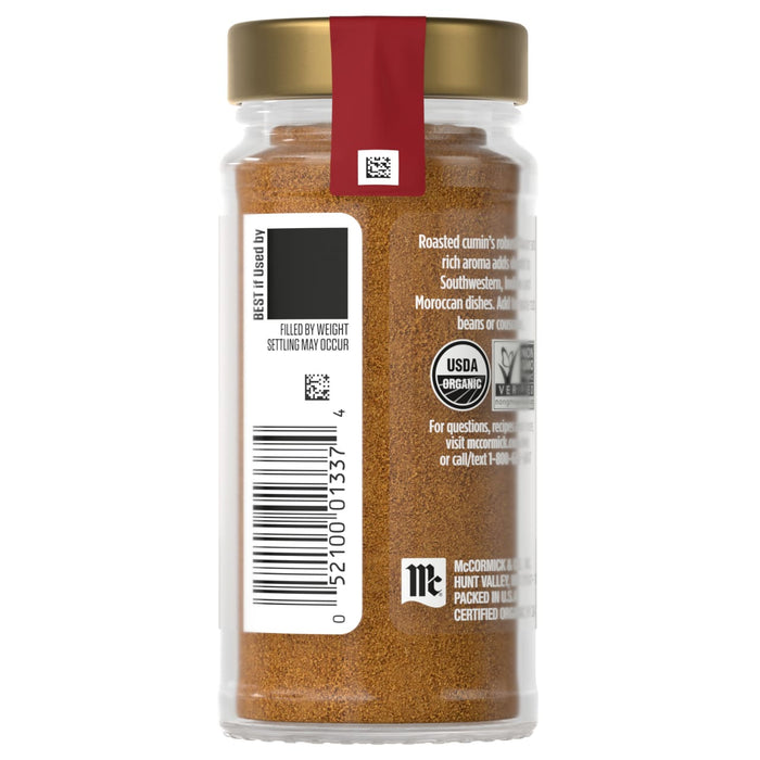 The image shows a McCormick Organic Ground Cumin spice bottle with its label and barcode.