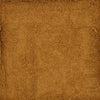 A textured brown surface, reminiscent of suede or fine leather, providing a warm and earthy background.