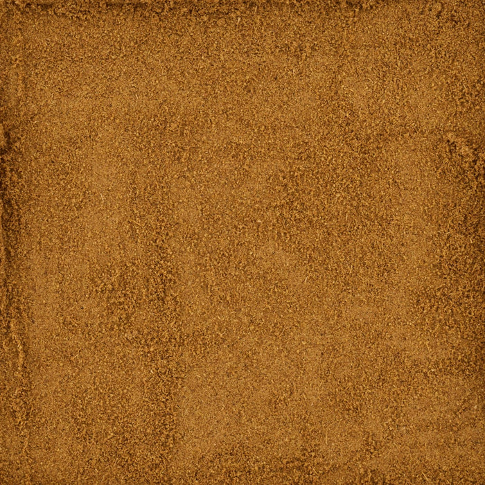 A textured brown surface, reminiscent of suede or fine leather, providing a warm and earthy background.