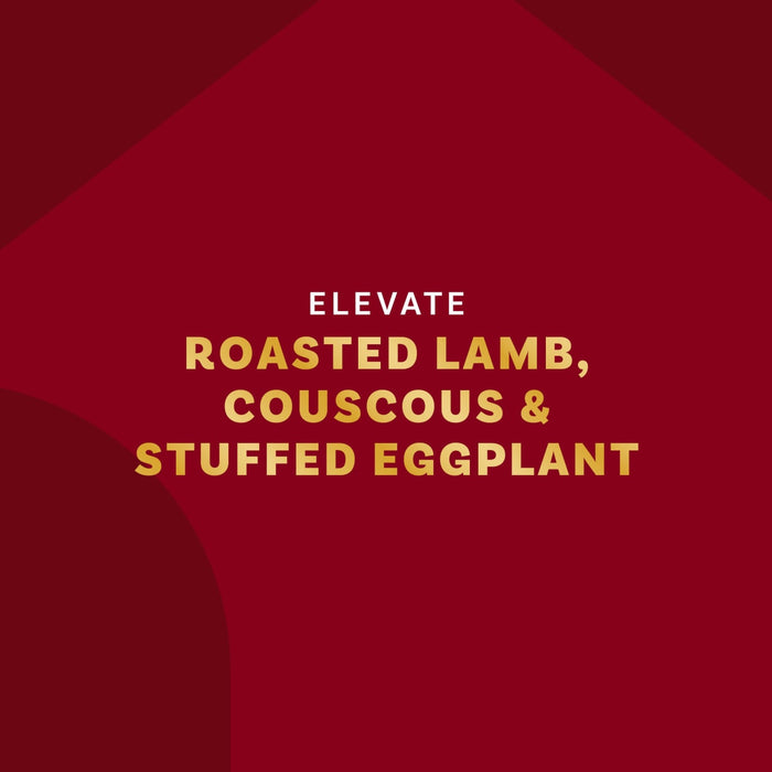 Elevate brand advertisement featuring roasted lamb, couscous, and stuffed eggplant.