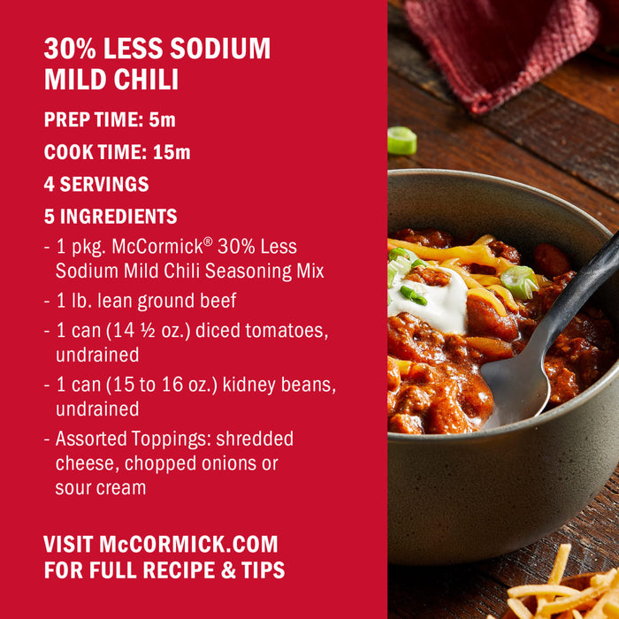 McCormick 30% Less Sodium Mild Chili recipe with a bowl of chili topped with shredded cheese, chopped onions, and sour cream.