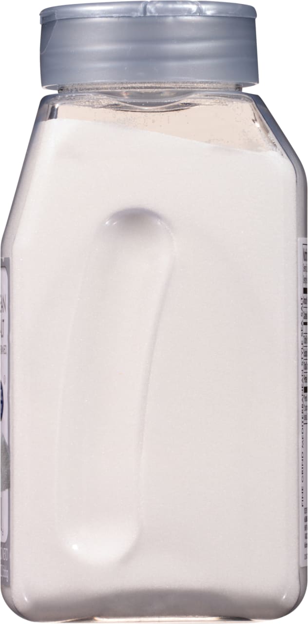 A white plastic container of Himalayan Pink Salt.