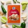A package of McCormick Fajita Seasoning Mix with a serving suggestion of a fajita in a tortilla.