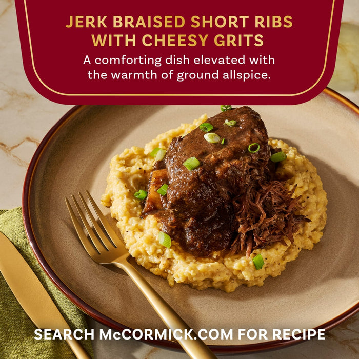 A plate of McCormick Jerk Braised Short Ribs with Cheesy Grits is shown.