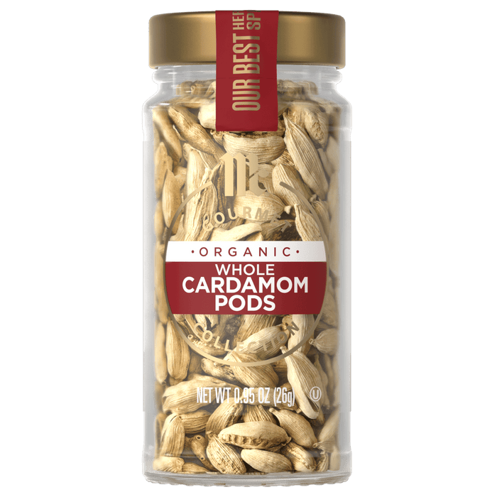 A jar of McCormick Organic Whole Cardamom pods.
