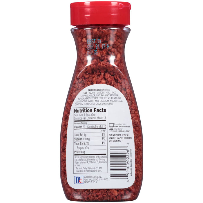 McCormick Bacon Bits - Applewood, a small jar of red bacon bits with nutrition facts and ingredients listed on the label.
