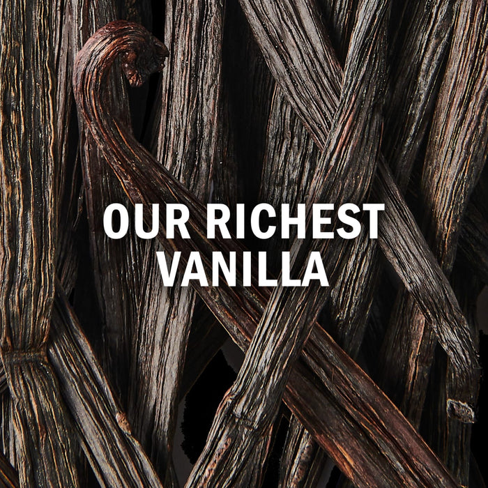 A close-up of vanilla beans with the text Our Richest Vanilla overlaid highlighting the products premium quality.