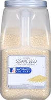 A clear plastic container of McCormick Culinary Whole Sesame Seeds.