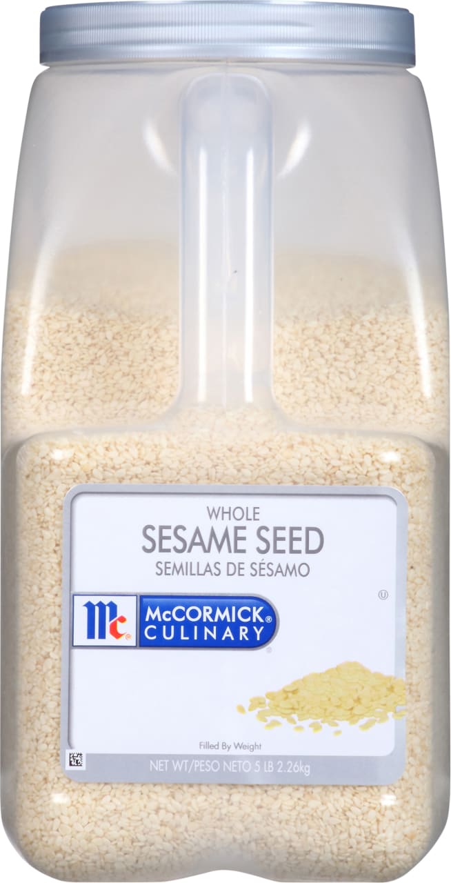 A clear plastic container of McCormick Culinary Whole Sesame Seeds.