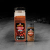 Two containers of Kosmos Q Dirty Bird BBQ Rub are displayed, showcasing the product's packaging and size variations.