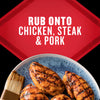 A close-up of grilled chicken, steak, and pork with the text Rub onto chicken, steak &amp; pork suggesting a seasoning or rub product.
