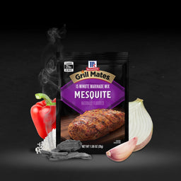 A package of McCormick Grill Mates 15 Minute Marinade Mix in Mesquite flavor is displayed with a red pepper onion garlic charcoal and salt.