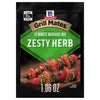 A package of McCormick Grill Mates 15 Minute Marinade Mix in Zesty Herb flavor is displayed, showcasing colorful grilled vegetable skewers.