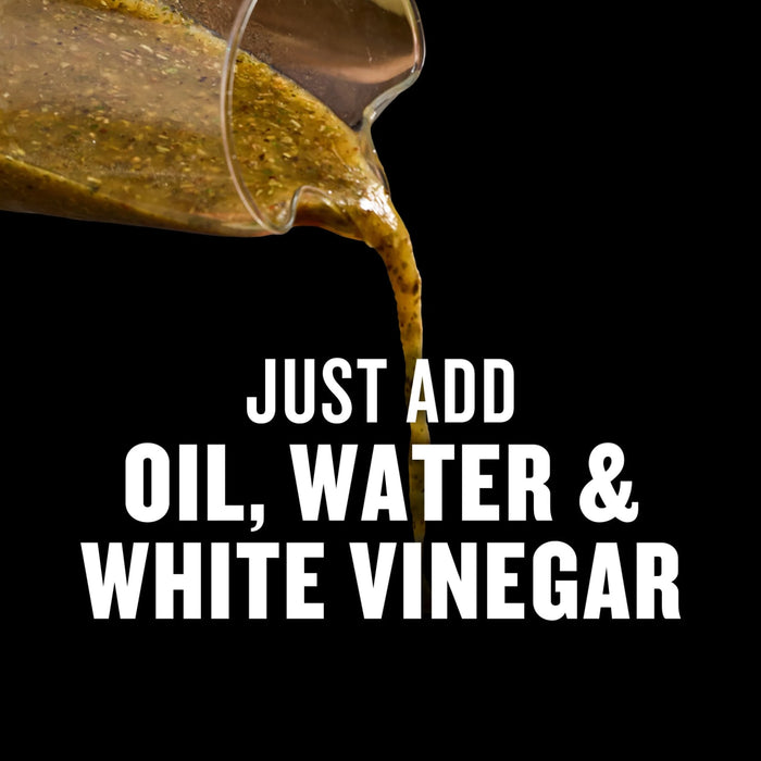 A liquid mixture is being poured from a glass container, with text overlay stating Just add oil, water &amp; white vinegar.