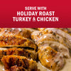 Holiday roast turkey and chicken are served with a delicious sauce.