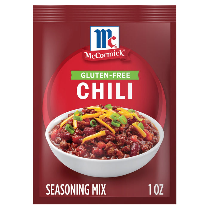A packet of McCormick Gluten-Free Chili Seasoning Mix is displayed, showcasing a bowl of chili topped with cheese and green onions.