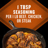 The Mccormick Grill Mates Brown Sugar Bourbon Blend Gf 3.0 Oz is shown with usage instructions recommending 1 tablespoon of seasoning per 1 pound of beef, chicken, or steak, displayed above a cast iron skillet filled with seasoned chicken and peaches.