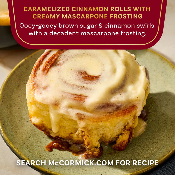 A delicious McCormick caramelized cinnamon roll with creamy mascarpone frosting.