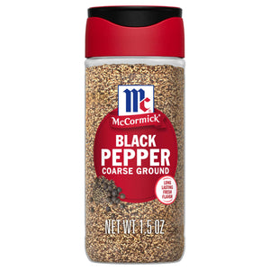 A container of McCormick Black Pepper Coarse Ground seasoning.