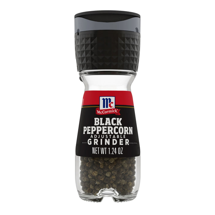 A McCormick Black Peppercorn Adjustable Grinder with black peppercorns inside.