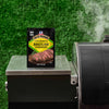 A packet of McCormick Grill Mates Brazilian Steakhouse seasoning sits on a grill.