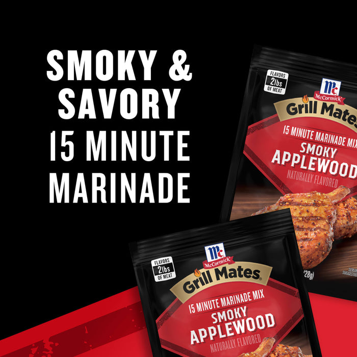 A package of McCormick Grill Mates Smoky Applewood 15 Minute Marinade is displayed, highlighting its smoky and savory flavor.