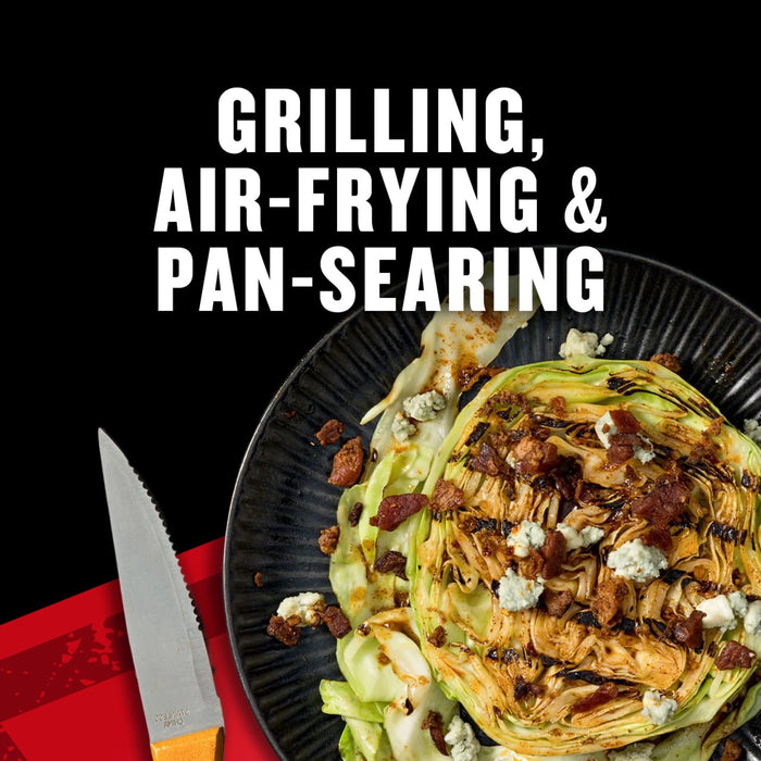A plate of grilled cabbage wedges topped with bacon and blue cheese crumbles, showcasing grilling, air-frying, and pan-searing cooking methods.