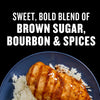 A close-up of grilled chicken with rice, highlighting the sweet, bold blend of brown sugar, bourbon, and spices.