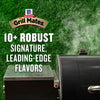 A close-up of a grill with smoke rising, advertising Grill Mates and their 10+ robust signature, leading-edge flavors.