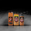 Three bottles of BBQ rubs from Pit Boss Grills are displayed against a dark background.