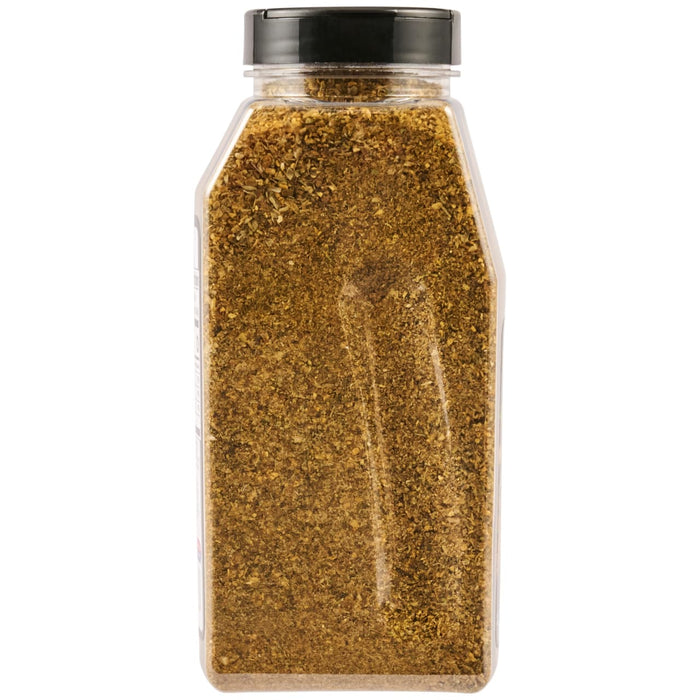 A clear plastic container filled with dried herbs and spices sealed with a black lid.