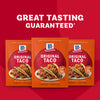 A package of Mccormick Taco Seasoning Mix featuring two tacos as a serving suggestion, with text highlighting no artificial flavors, no MSG, and all natural herbs and spices.