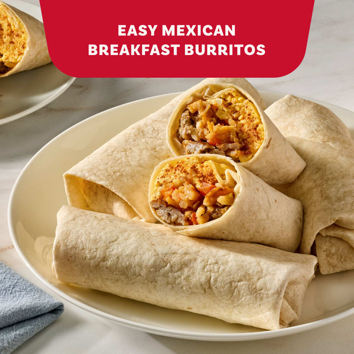 A plate of easy Mexican breakfast burritos filled with eggs and sausage seasoned with Mccormick Original Taco Seasoning Mix 1 Oz.