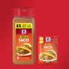 Two McCormick Taco Seasoning packages one large and one small with a red background.