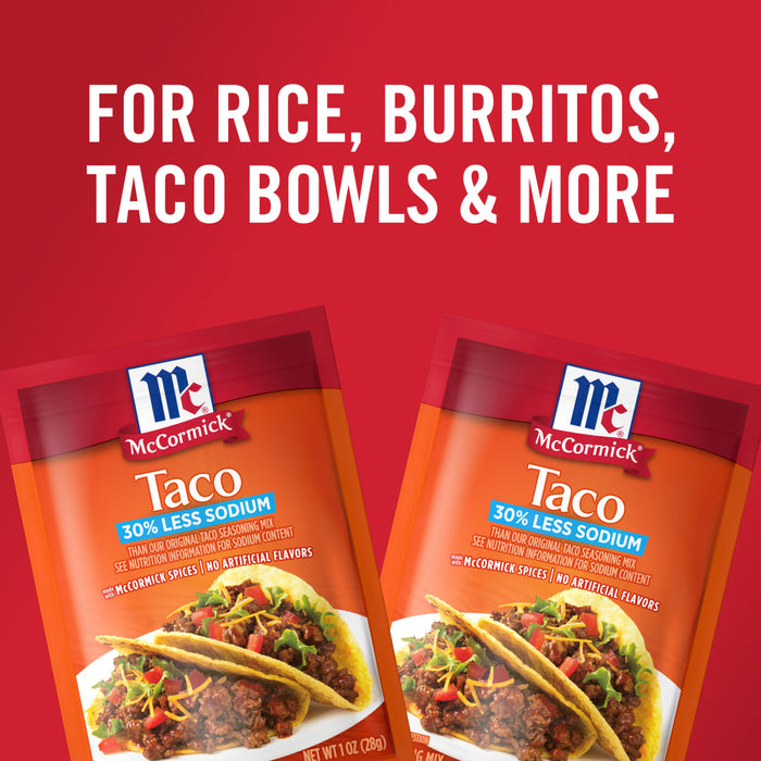 Two McCormick Taco Seasoning packets with 30% less sodium and no artificial flavors with a picture of two tacos on each.