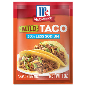 McCormick Mild Taco Seasoning Mix with 30% less sodium with a picture of two tacos on a white plate.
