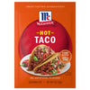 A package of Mccormick Hot Taco Seasoning Mix 1 Oz featuring two prepared tacos filled with seasoned meat and fresh toppings on a bright orange background.