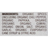 A list of ingredients for a product including organic spices onion garlic and cane syrup.
