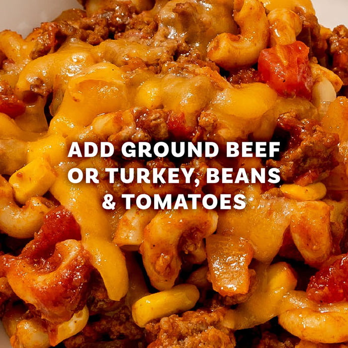 A close-up of a cheesy taco pasta bake, a delicious meal idea using Mccormick Organics Regular Taco Seasoning Mix 1 Oz with ground meat, beans, and tomatoes.