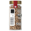 A jar of McCormick Organic Toasted Sesame Seeds with a gold lid and a red label.