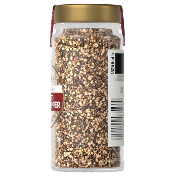 A jar of McCormick crushed red pepper is shown, likely used to add spice to food.