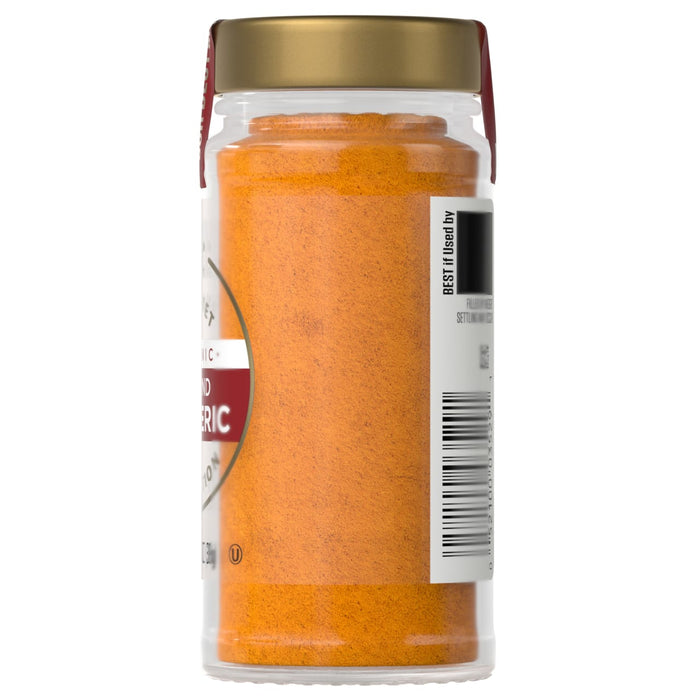 A jar of McCormick turmeric spice is shown.