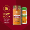 McCormick's new look for their Gourmet Collection of herbs and spices is showcased with ground turmeric in a glass jar.