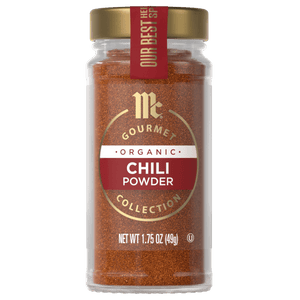 A jar of McCormick Gourmet Organic Chili Powder.