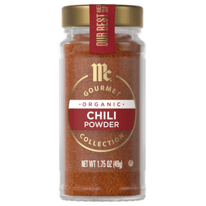 A jar of McCormick Gourmet Organic Chili Powder.