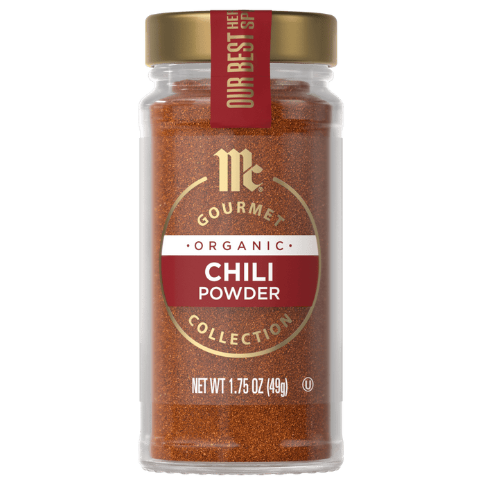 A jar of McCormick Gourmet Organic Chili Powder.