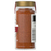 A jar of McCormick chili powder is displayed, showcasing its vibrant color and texture.