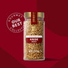 A jar of McCormick Anise Seed, part of the Gourmet Our Best Collection, is displayed against a red background.
